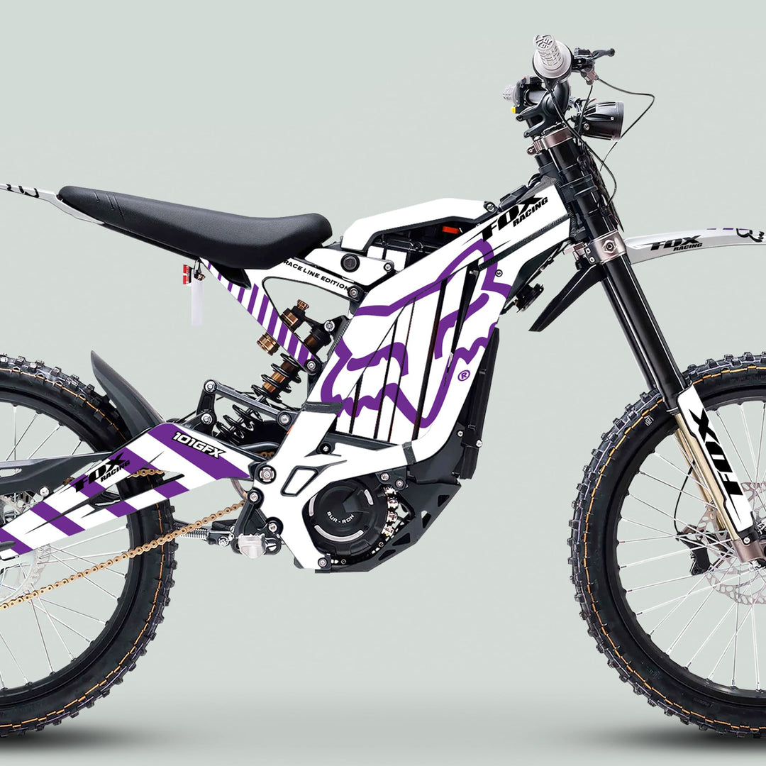 Surron Light Bee X Graphics Kit FOX RACE LINE White Purple, featuring durable decals with fox-head logo and branding, enhancing aesthetic appeal with seamless fit.