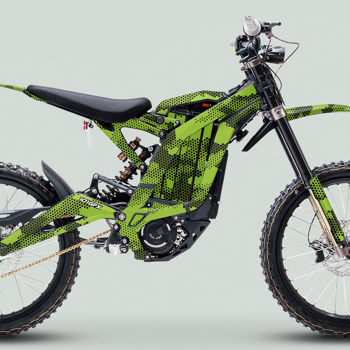 Surron Light Bee X Graphics Kit HEXOCAM Green on an e-dirt bike, showcasing a honeycomb camo design with durable vinyl for unique style and protection.