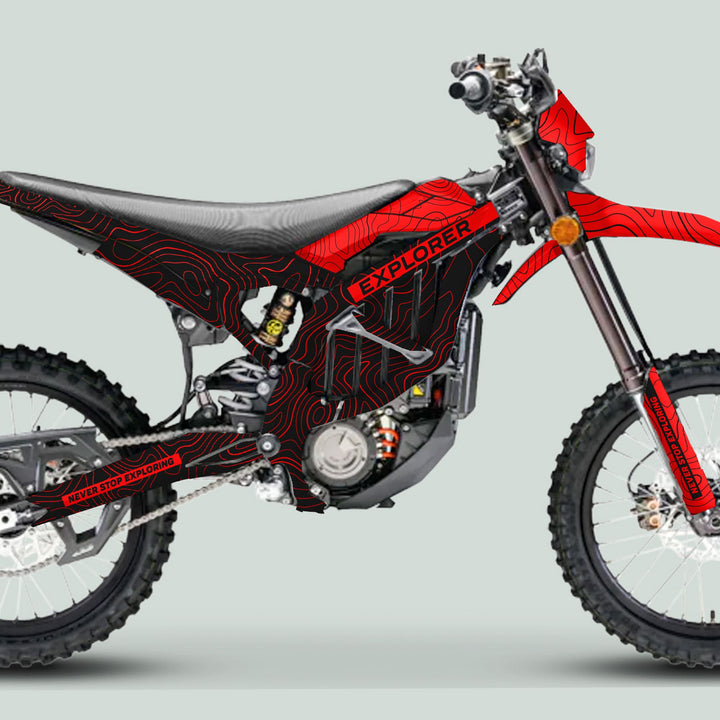 Surron Ultra Bee Graphics Kit EXPLORER BLACK RED on a dirt bike, featuring red contour lines and bold branding, highlighting durability and easy installation.