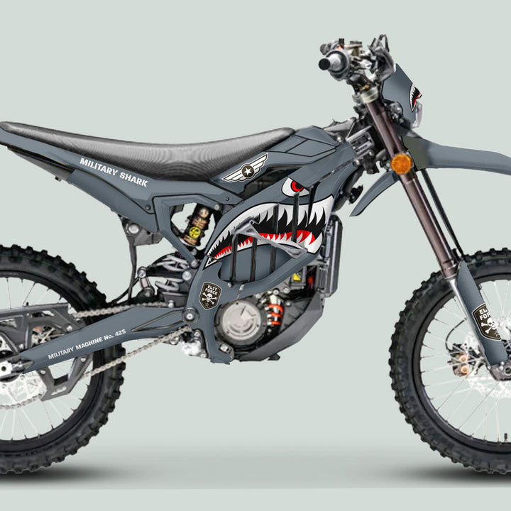 Surron Ultra Bee Graphics Kit in Military Shark Grey camouflage, featuring shark-mouth art, military insignia, and high-quality vinyl for a unique off-road motorcycle look.