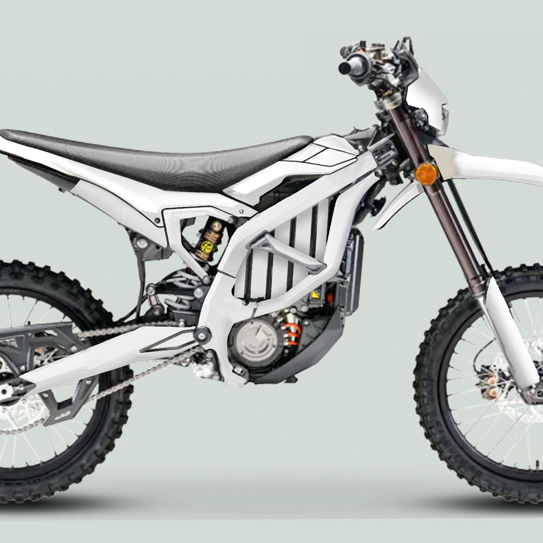 Surron Ultra Bee Graphics Kit SOLID COLOR WHITE on an electric dirt bike, highlighting its knobby tires, tubular frame, and sleek design for enhanced style and protection.